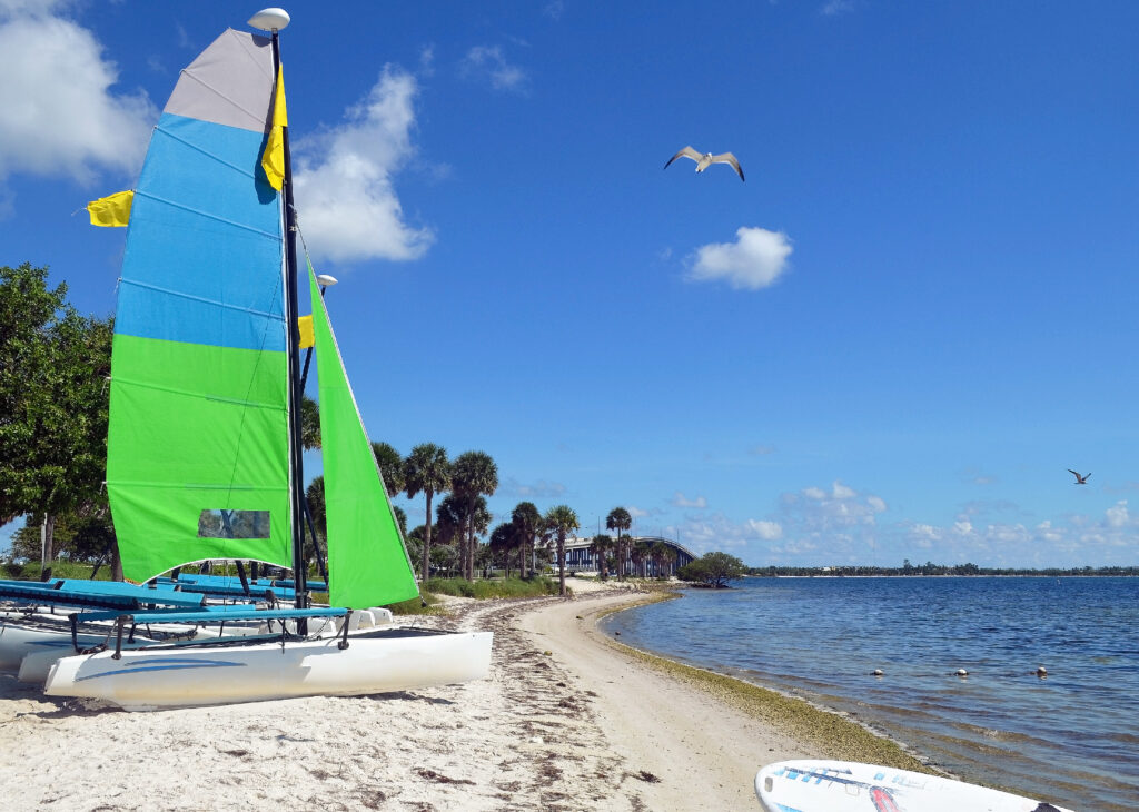 a rental sailing catamaran in the sand at hobie beach