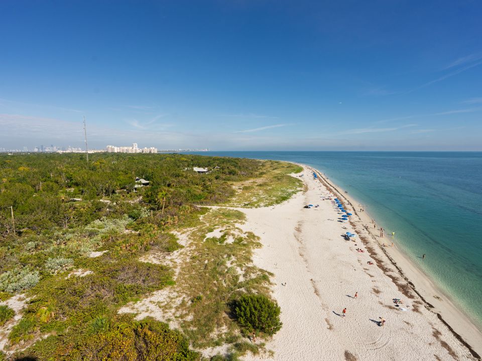 Aerial view of tourists relaxing on Bill Baggs Cape Florida State Park beach