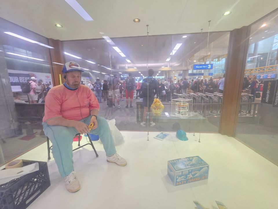 Duane Hanson's Vendor with Walkman sculpture at Baggage Claim 3 in FLL Terminal 1