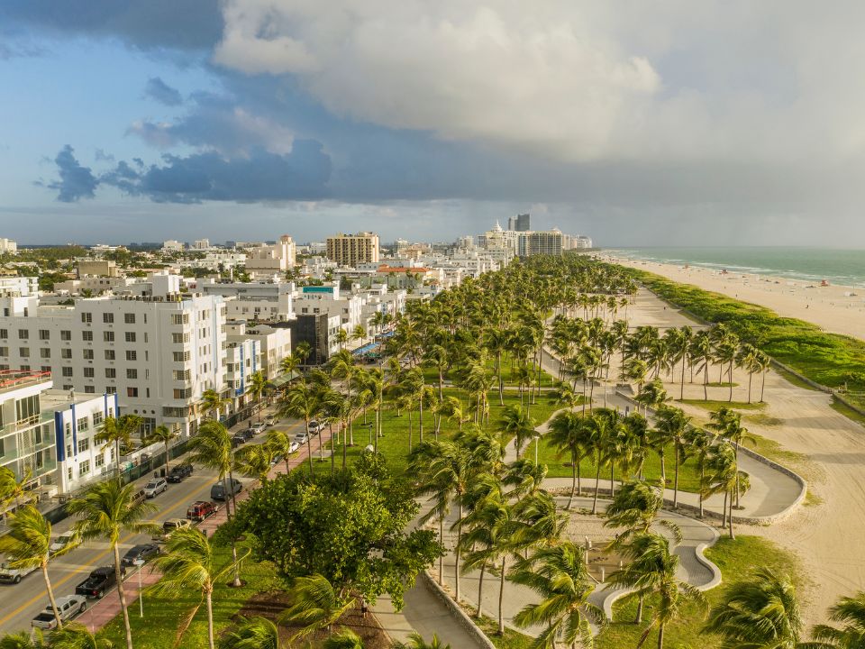 Aerial view of the art deco buildings on Ocean Drive, the Lummus Park and the beach of South Beach.